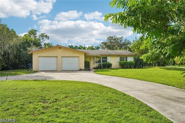 51 LAGOON DR, NORTH FORT MYERS, FL 33903 - Image 5ccd2a8fd5c6a6328bfa8fc64d0cdc28/1614575730