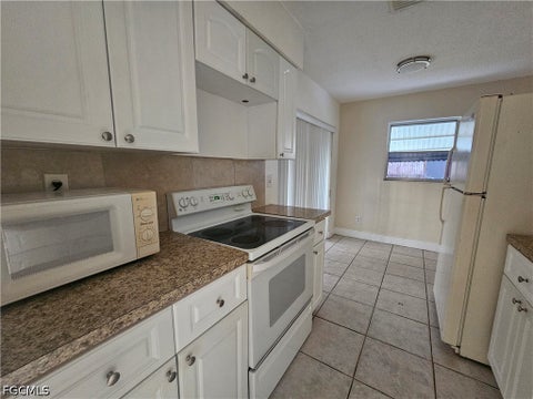 Tiny photo for 423 Morgan Circle S, Lehigh Acres, FL 33936 (MLS # 2026021957)