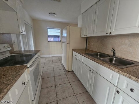 Tiny photo for 423 Morgan Circle S, Lehigh Acres, FL 33936 (MLS # 2026021957)