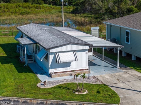 Tiny photo for 115 Conestoga Trail, North Fort Myers, FL 33917 (MLS # 2026039131)