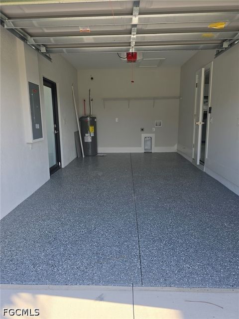 Tiny photo for 457 Woodman Drive, Lehigh Acres, FL 33972 (MLS # 2026020031)