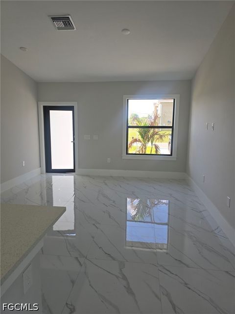 Tiny photo for 457 Woodman Drive, Lehigh Acres, FL 33972 (MLS # 2026020031)