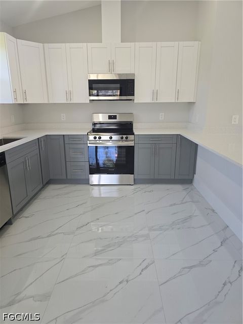 Tiny photo for 457 Woodman Drive, Lehigh Acres, FL 33972 (MLS # 2026020031)