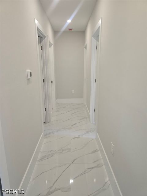 Tiny photo for 457 Woodman Drive, Lehigh Acres, FL 33972 (MLS # 2026020031)