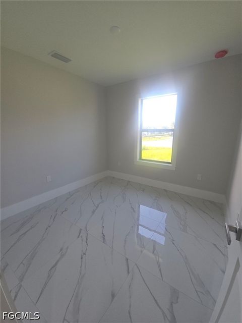 Tiny photo for 457 Woodman Drive, Lehigh Acres, FL 33972 (MLS # 2026020031)