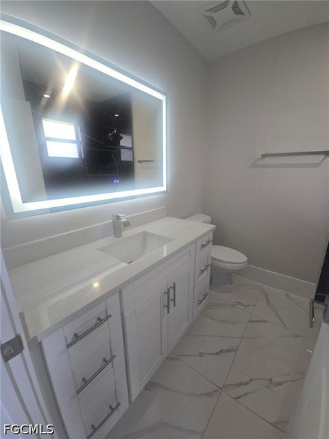 Tiny photo for 457 Woodman Drive, Lehigh Acres, FL 33972 (MLS # 2026020031)