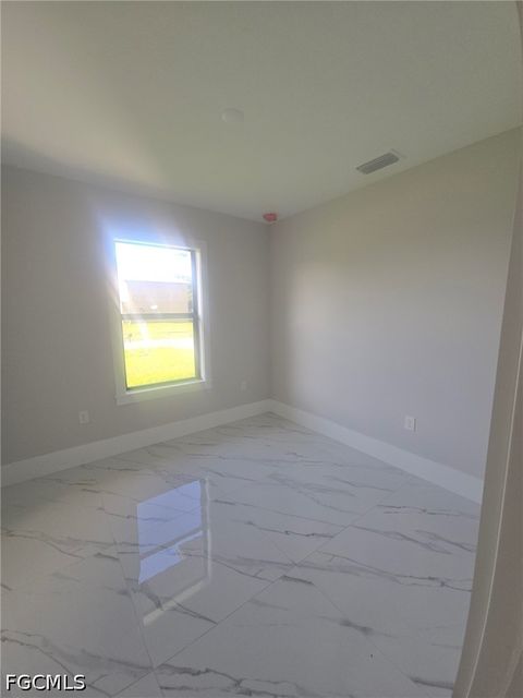 Tiny photo for 457 Woodman Drive, Lehigh Acres, FL 33972 (MLS # 2026020031)