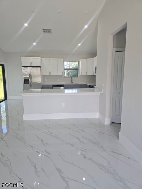 Tiny photo for 457 Woodman Drive, Lehigh Acres, FL 33972 (MLS # 2026020031)