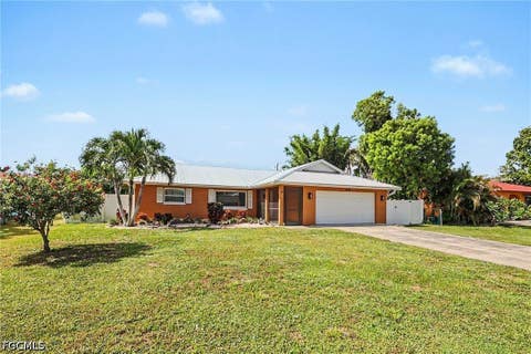 Photo of 918 Gleason Parkway, Cape Coral, FL 33914 (MLS # 2026035676)