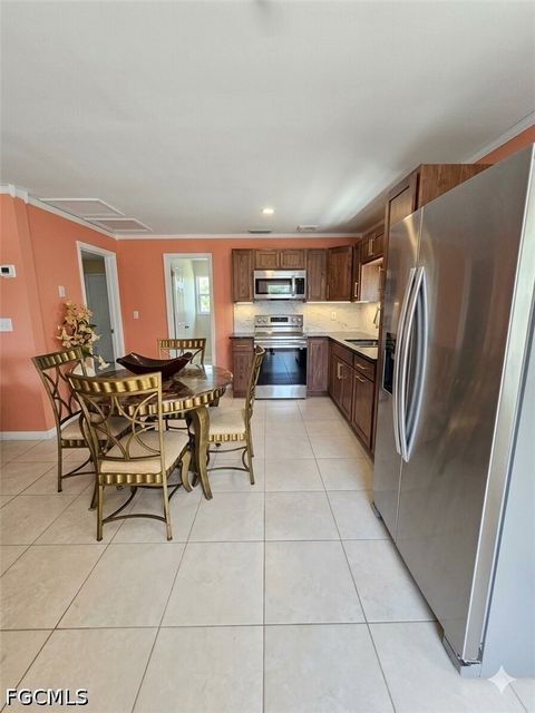 Tiny photo for 156 SW 47th Terrace #1, Cape Coral, FL 33914 (MLS # 2026016278)