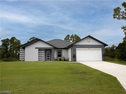 Photo of 970 Grant Boulevard, Lehigh Acres, FL 33974 (MLS # 2026020042)