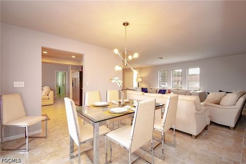 Tiny photo for 908 SE 33rd Street, Cape Coral, FL 33904 (MLS # 2026021566)