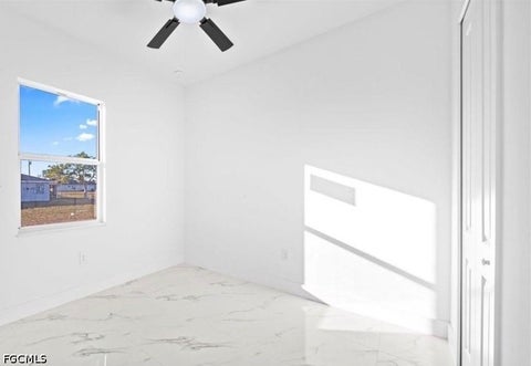 Tiny photo for 915 NE 15th Lane, Cape Coral, FL 33909 (MLS # 2026028358)