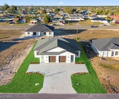 Tiny photo for 915 NE 15th Lane, Cape Coral, FL 33909 (MLS # 2026028358)