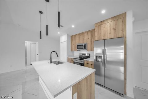 Tiny photo for 311 NE 31st Street, Cape Coral, FL 33909 (MLS # 2026018656)