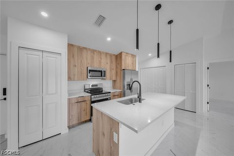 Tiny photo for 311 NE 31st Street, Cape Coral, FL 33909 (MLS # 2026018656)