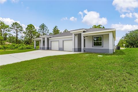 Photo of 913 E 12th Street, Lehigh Acres, FL 33972 (MLS # 2025017300) Photo of 913 E 12th Street, Lehigh Acres, FL 33972 (MLS # 2025017300)