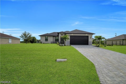 Photo of 1909 NE 19th Place, Cape Coral, FL 33909 (MLS # 2026042267)