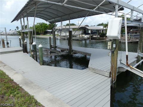 Tiny photo for 2371 Sycamore Street, St James City, FL 33956 (MLS # 2026025679)