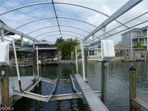 Tiny photo for 2371 Sycamore Street, St James City, FL 33956 (MLS # 2026025679)