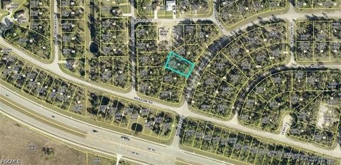 Photo of 505 Nimitz Boulevard, Lehigh Acres, FL 33974 (MLS # 2026020176)
