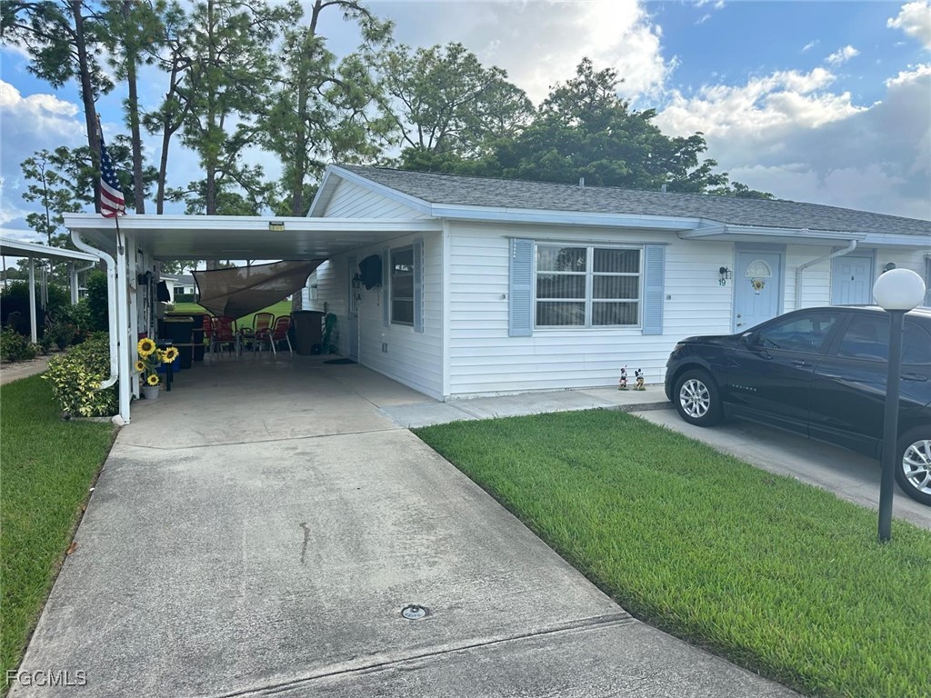 Photo 1 of 25 — 19 Pinewood Boulevard, Lehigh Acres, FL 33936