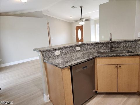 Tiny photo for 827 NE 23rd Terrace, Cape Coral, FL 33909 (MLS # 2026018873)