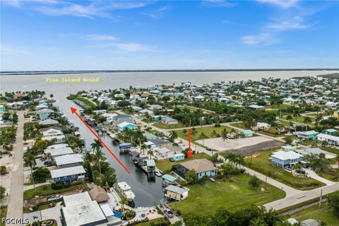 Photo of 2478 Baybreeze Street, St James City, FL 33956 (MLS # 2026038923)