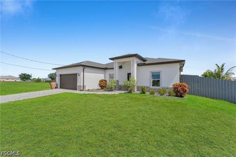 Tiny photo for 405 NW 10th Street, Cape Coral, FL 33993 (MLS # 2026025688)
