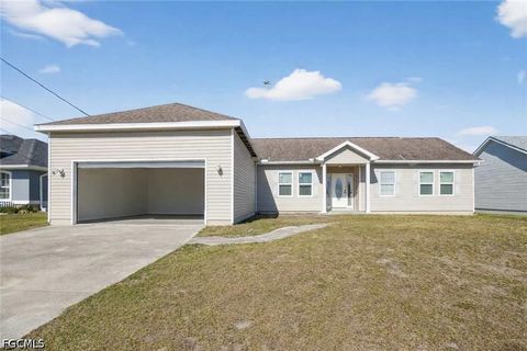 Photo of 2808 34th Street SW, Lehigh Acres, FL 33976 (MLS # 2026022576)