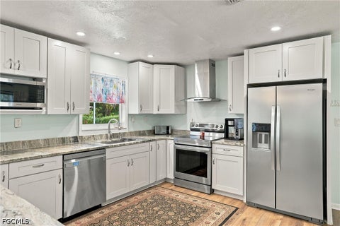 Tiny photo for 12490 Cristi Way, Bokeelia, FL 33922 (MLS # 2026042250)