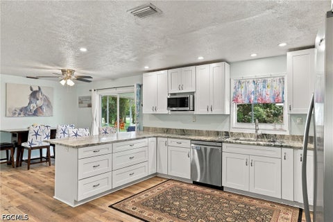 Tiny photo for 12490 Cristi Way, Bokeelia, FL 33922 (MLS # 2026042250)