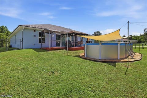 Tiny photo for 404 Parkdale Boulevard, Lehigh Acres, FL 33974 (MLS # 2026030808)