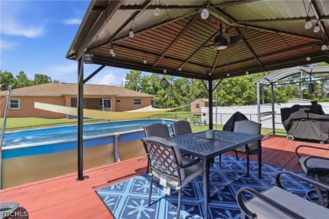 Tiny photo for 404 Parkdale Boulevard, Lehigh Acres, FL 33974 (MLS # 2026030808)