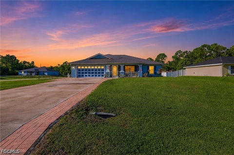 Photo of 404 Parkdale Boulevard, Lehigh Acres, FL 33974 (MLS # 2026030808)