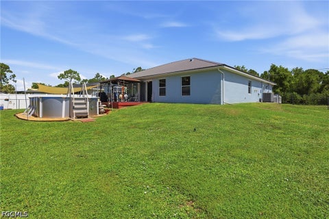Tiny photo for 404 Parkdale Boulevard, Lehigh Acres, FL 33974 (MLS # 2026030808)