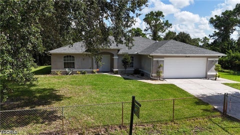 Photo of 1025 Iris Street E, Lehigh Acres, FL 33974 (MLS # 2026038568)