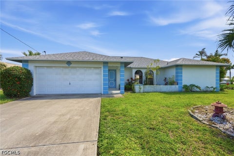 Photo of 202 SE 37th Terrace, Cape Coral, FL 33904 (MLS # 2026039211)