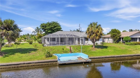 Tiny photo for 202 SE 37th Terrace, Cape Coral, FL 33904 (MLS # 2026039211)