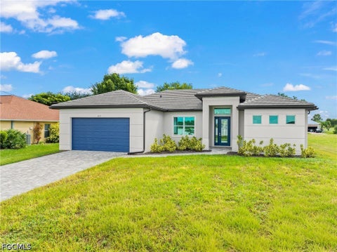 Photo of 1609 NW 31st Place, Cape Coral, FL 33993 (MLS # 2026042039)