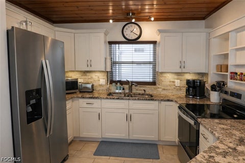 Tiny photo for 16191 Porto Bello Street, Bokeelia, FL 33922 (MLS # 2026031016)