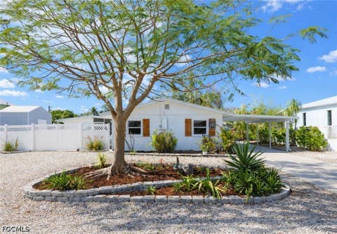 Photo of 16191 Porto Bello Street, Bokeelia, FL 33922 (MLS # 2026031016)