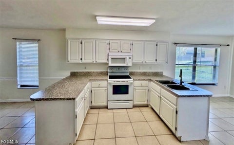 Tiny photo for 1804 SW 21st Lane #A, Cape Coral, FL 33991 (MLS # 2026039499)