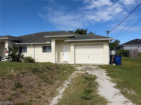 Photo of 704 Gilbert Avenue S, Lehigh Acres, FL 33973 (MLS # 2026018952)