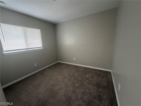 Tiny photo for 704 Gilbert Avenue S, Lehigh Acres, FL 33973 (MLS # 2026018952)