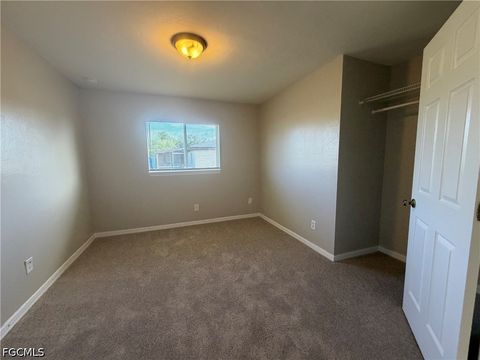 Tiny photo for 704 Gilbert Avenue S, Lehigh Acres, FL 33973 (MLS # 2026018952)