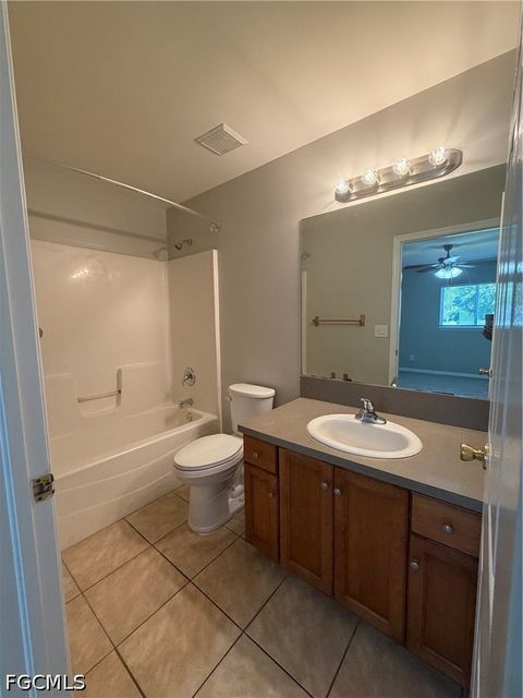 Tiny photo for 704 Gilbert Avenue S, Lehigh Acres, FL 33973 (MLS # 2026018952)