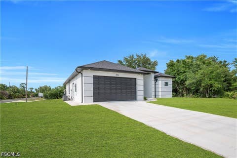 Tiny photo for 506 W 5th Street, Lehigh Acres, FL 33972 (MLS # 2026030674)