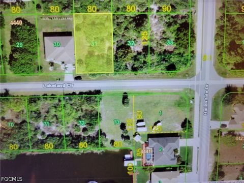 Photo of 15545 Lakeland Circle, Port Charlotte, FL 33981 (MLS # 2026020082)