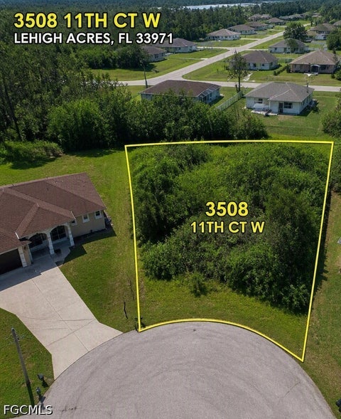 Photo of 3508 11th Court W, Lehigh Acres, FL 33971 (MLS # 2026039578)